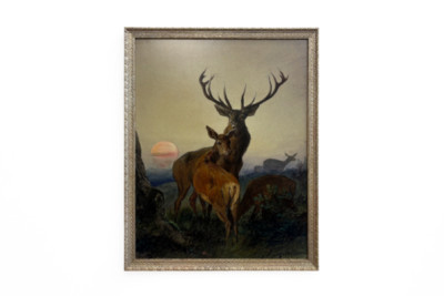 Ein Hirsch mit einem Reh in einer bewaldeten Landschaft bei Sonnenuntergang - Carl Friedrich Deiker