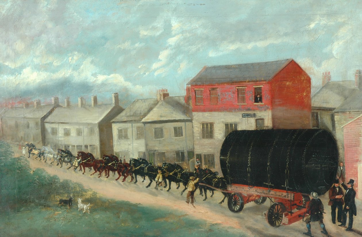 Ein Mühlenkessel wird auf einem Wagen den Hügel hinauf transportiert von British School