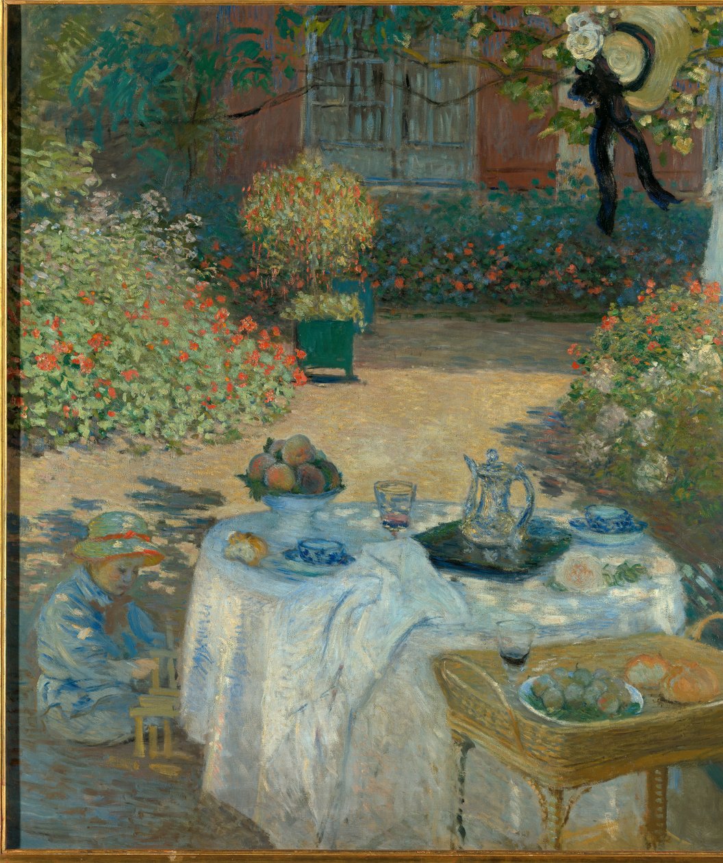 Das Frühstück im Garten von Monet in Argenteuil von Claude Monet