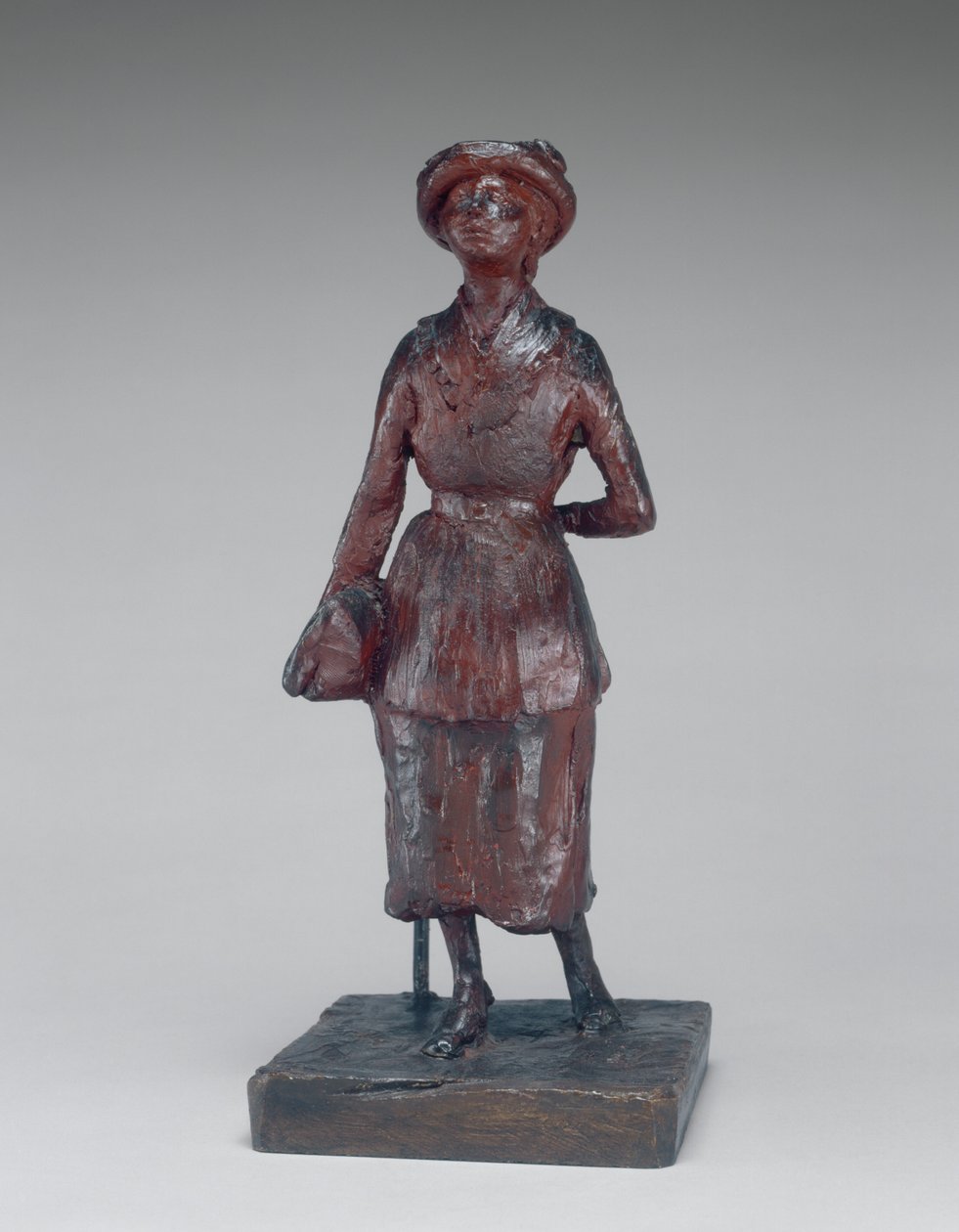 Das Schulmädchen geht auf der Straße von Edgar Degas