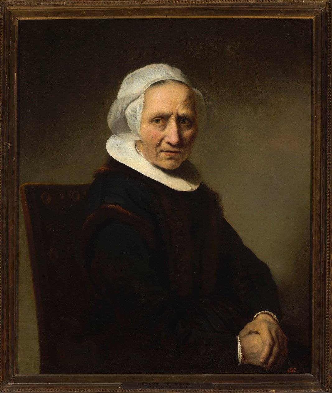 Porträt einer alten Frau mit weißer Haube von Ferdinand Bol