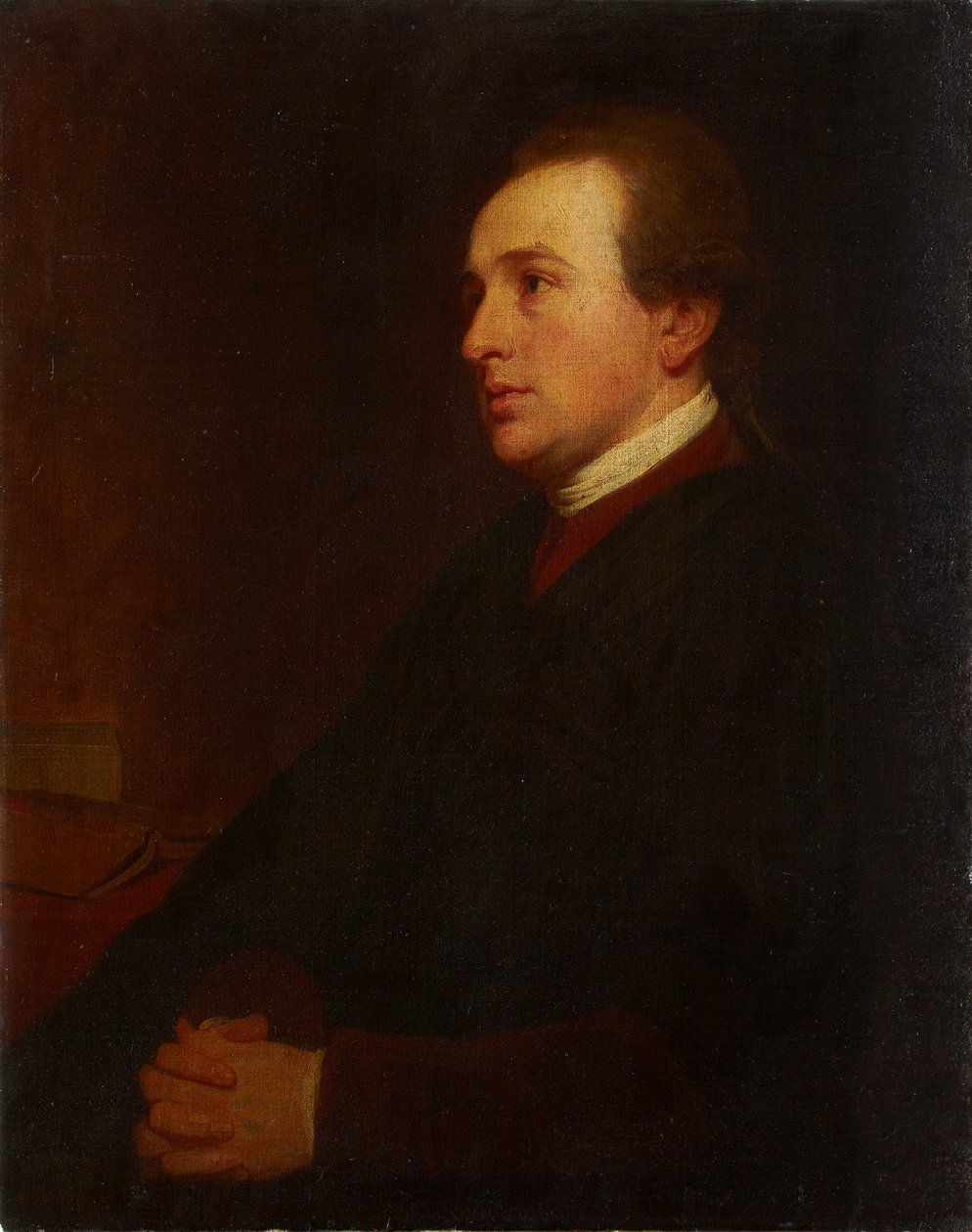 Porträt eines jungen Mannes an seinem Schreibtisch von George Romney