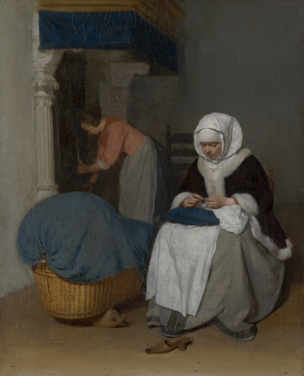 Frau näht neben einer Wiege von Gerard ter Borch