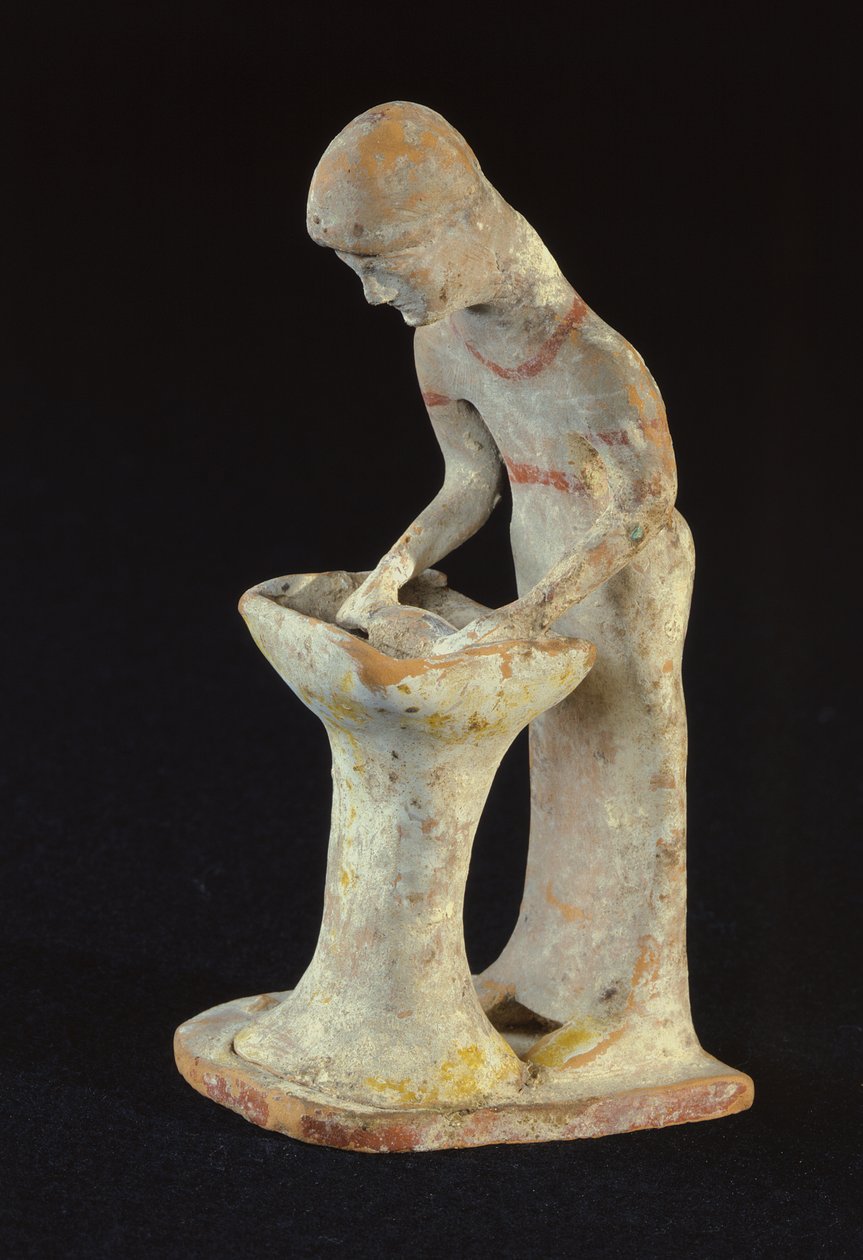 Statuette einer Frau, die Teig ausrollt, aus Tanagra, Böotien von Greek
