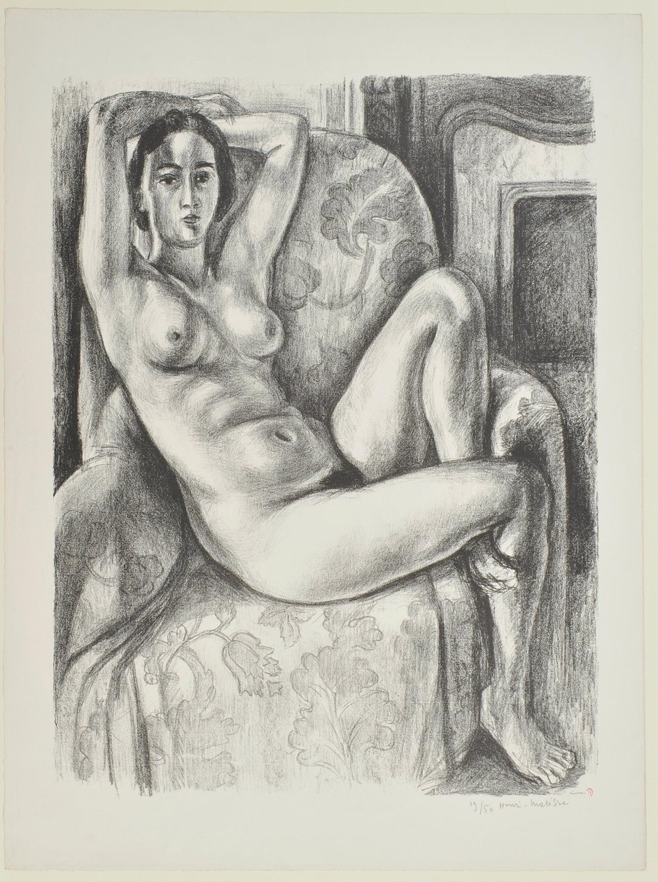 Akt auf blauem Kissen neben einem Kamin von Henri Matisse