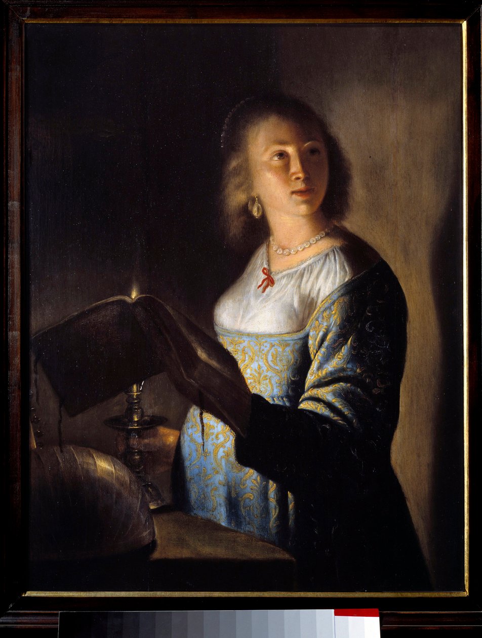 Junges Mädchen mit einer Kerze von Isaac de Jouderville