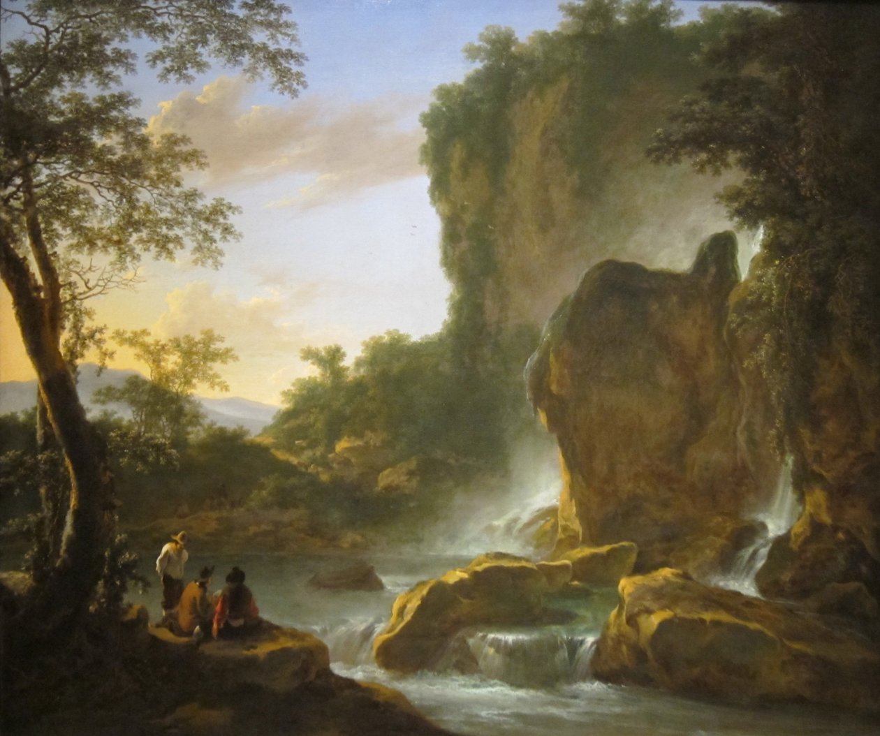Männer ruhen in einer bewaldeten Berglandschaft mit Wasserfällen von Jan Both