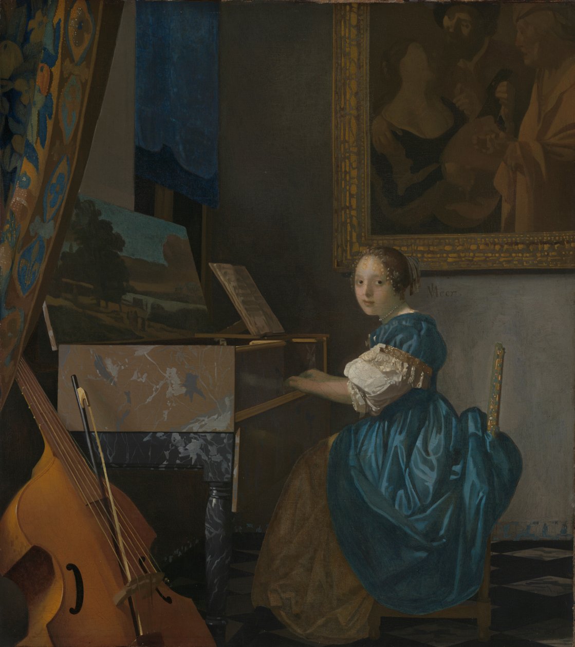 Eine junge Frau sitzt an einem Virginal von Johannes Vermeer