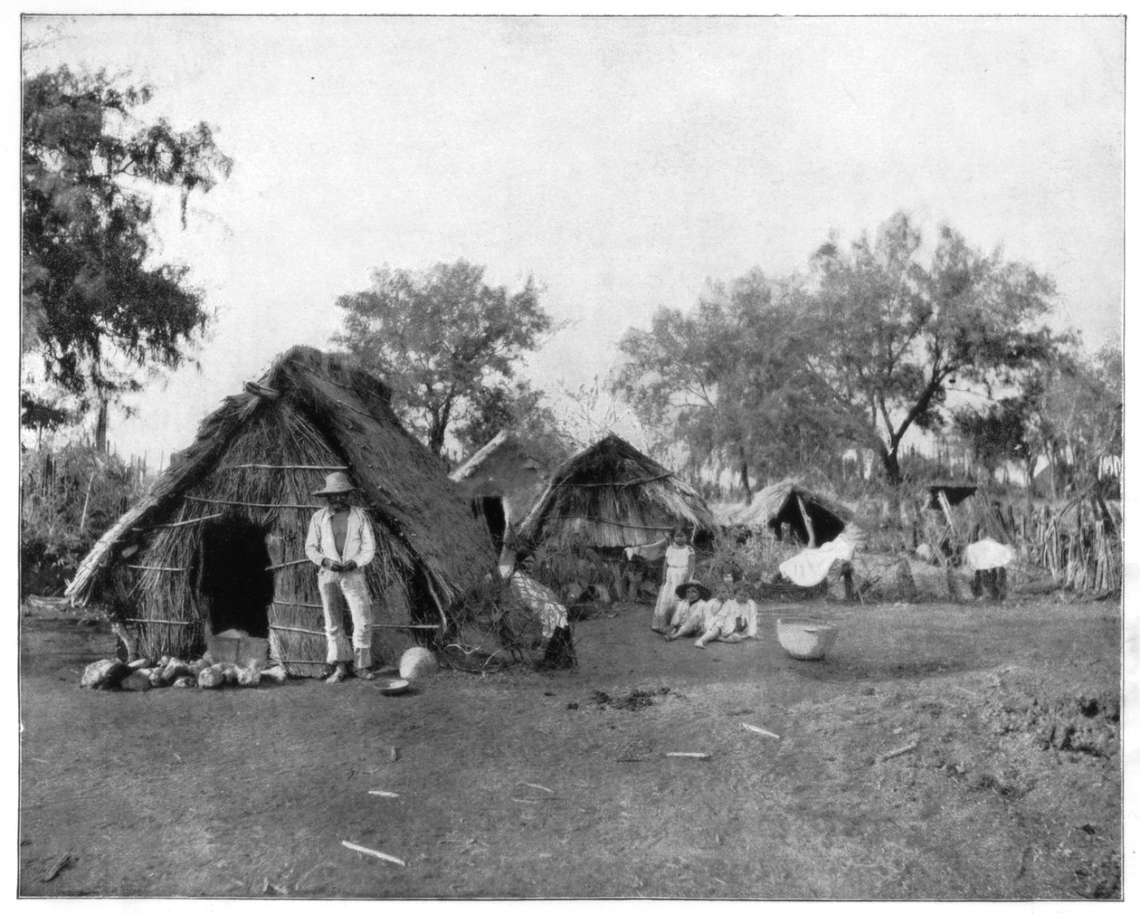 Strohhütten, Salamanca, Mexiko von John L. Stoddard