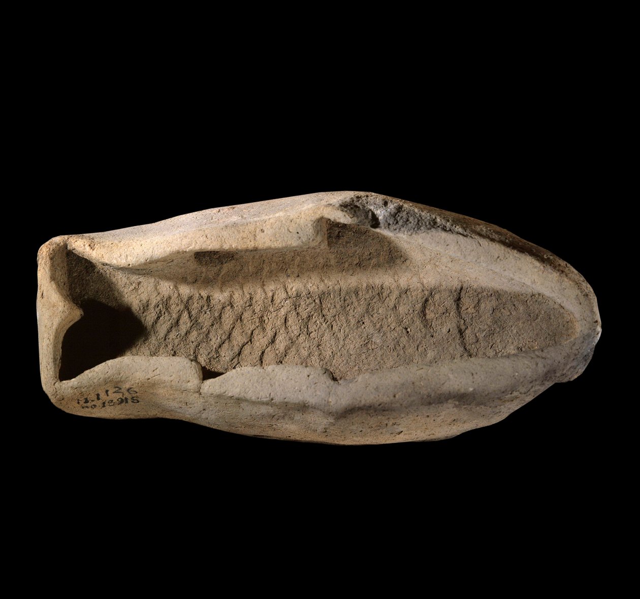 Mesopotamien: Terrakottaform in Fischform von Mesopotamian