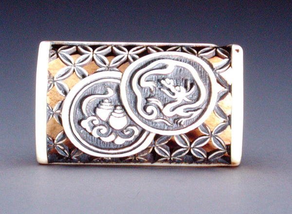 Netsuke mit durchbrochenem Design von Ozaki Kokusai