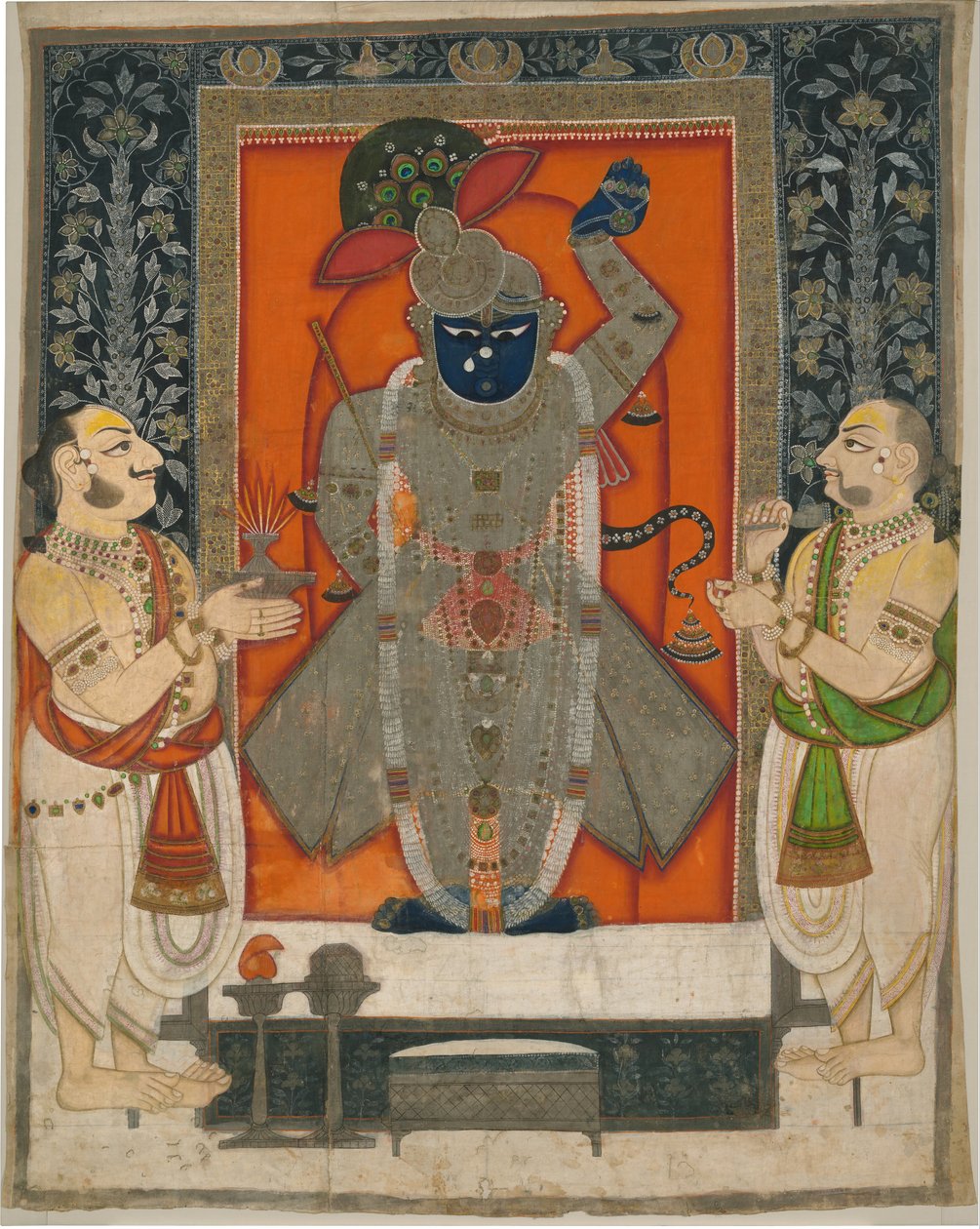 Priester verehren Krishna als Shrinathji für das Berg-der-Nahrung-Festival [Annakuta utsava]; Schreinbehang [pichhavai] von Rajasthan Kota school