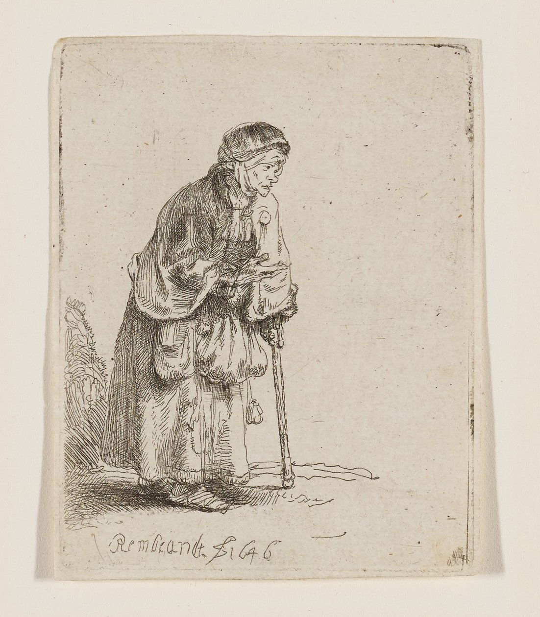 Bettlerin, die sich auf einen Stock stützt von Rembrandt van Rijn