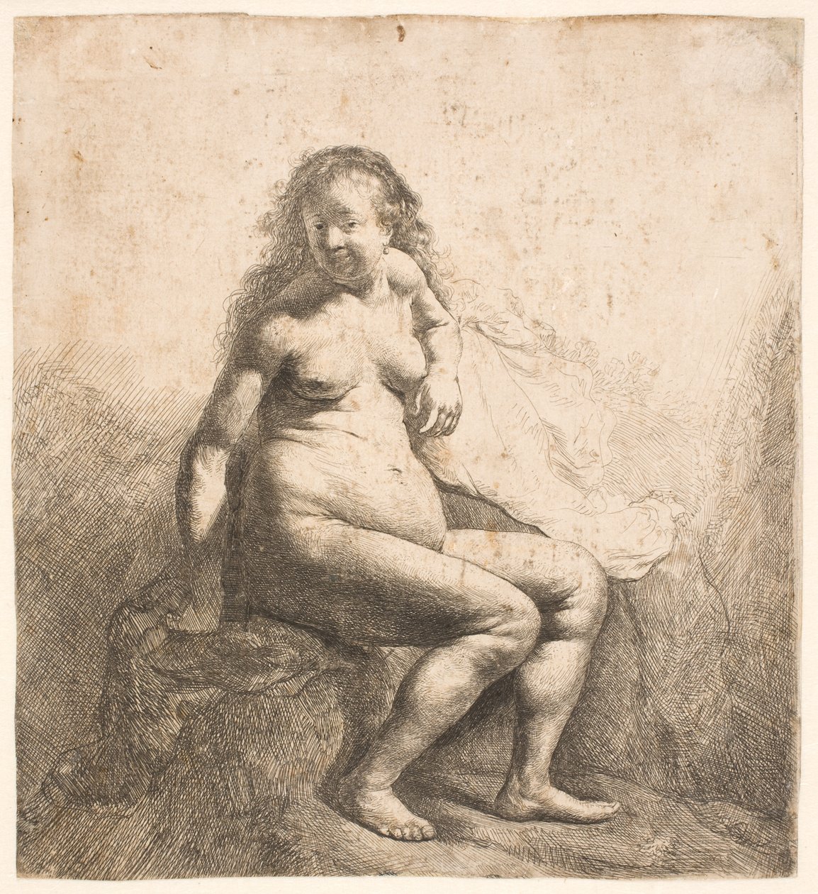 Nackte Frau auf einem Hügel sitzend von Rembrandt van Rijn