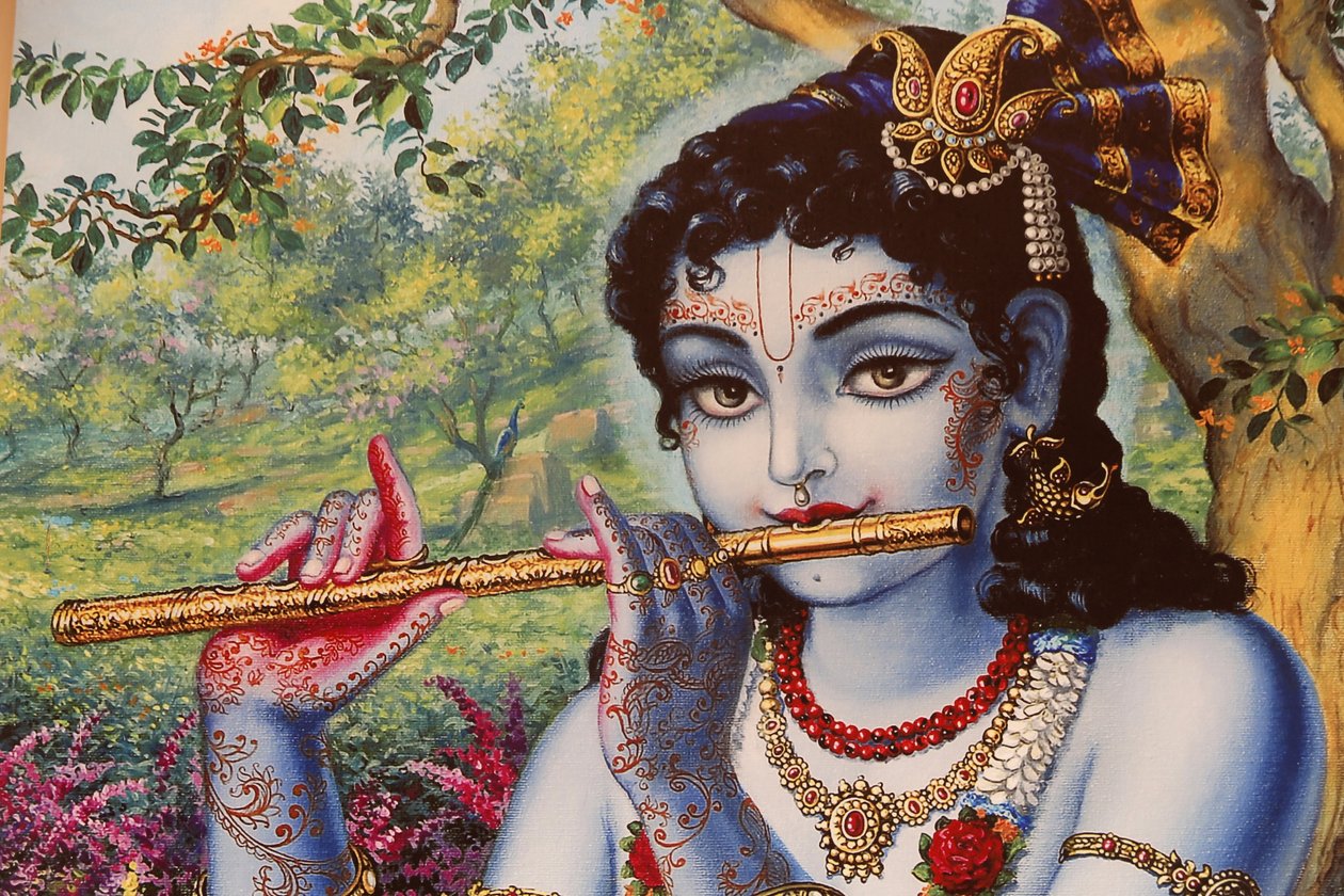Gemälde darstellend den hinduistischen Gott Krishna, der draußen Flöte spielt. Indien von Unbekannt
