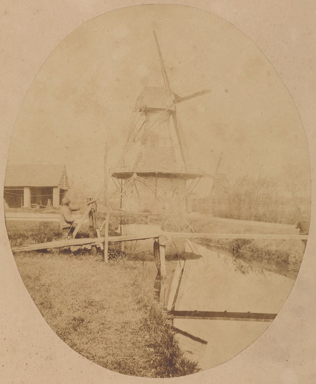 [Maler mit Hut an der Staffelei, der eine Windmühle malt] von Unknown artist
