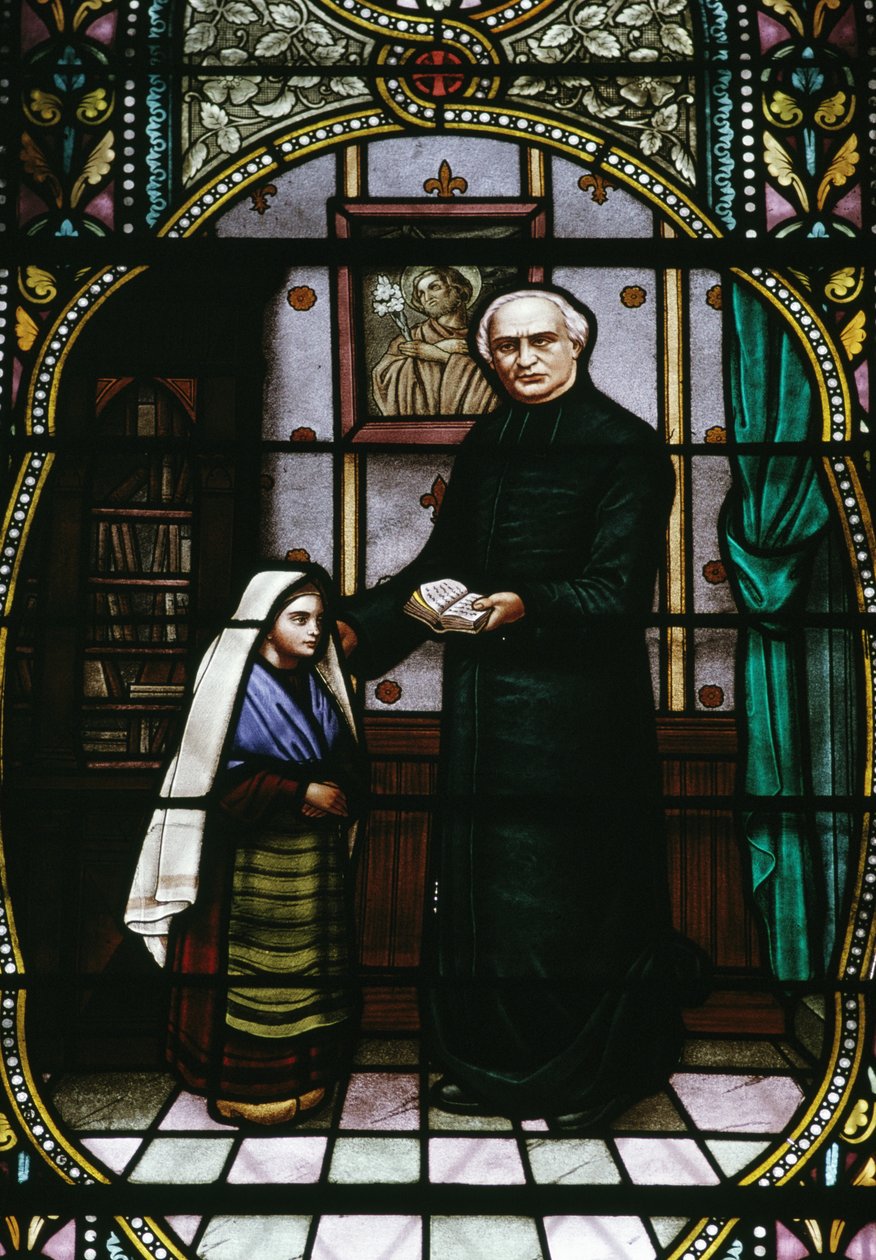 Bernadette und Abbe Peyramale, Buntglas in der Lourdes-Pfarrkirche, Languedoc-Roussillon-Midi-Pyrénées, Frankreich, 20. Jahrhundert von Unknown photographer
