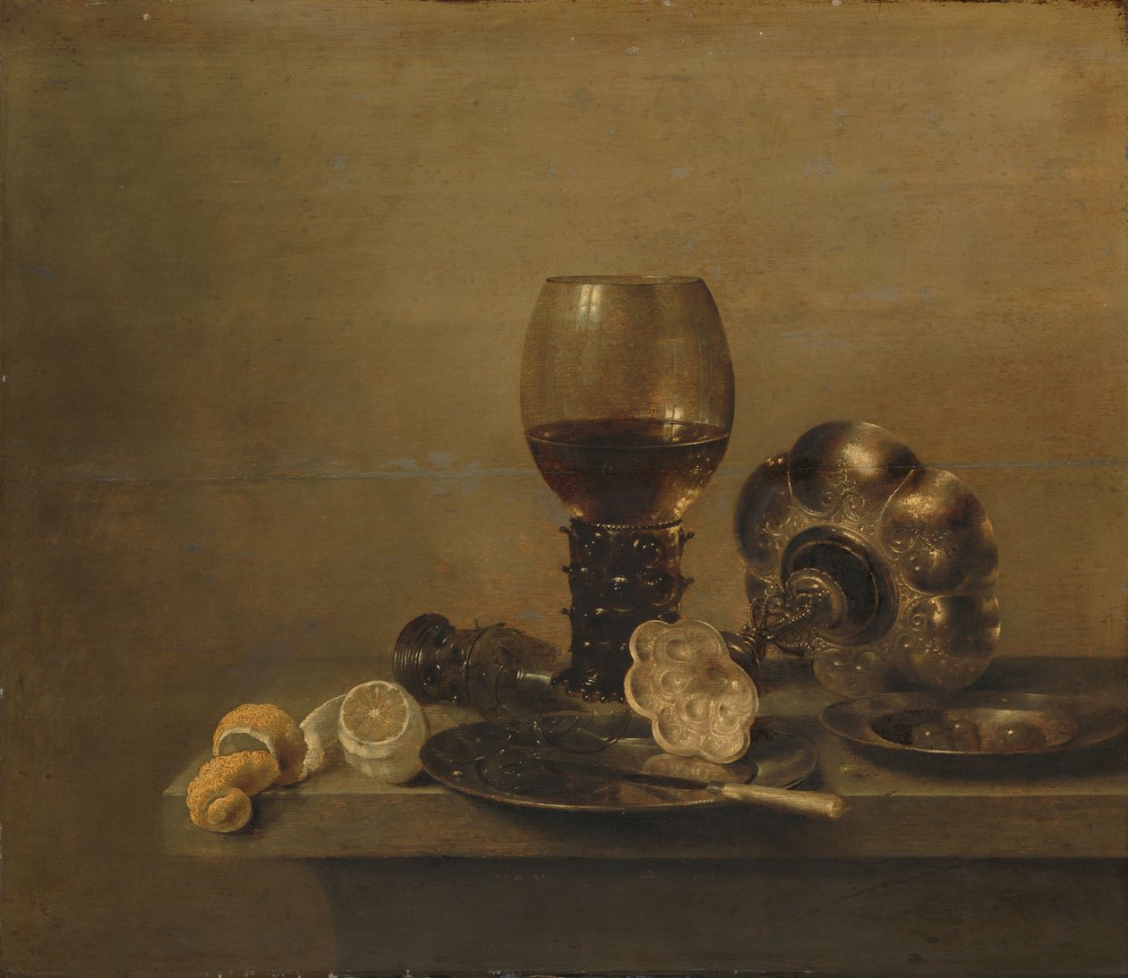 Stillleben mit einem zerbrochenen Glas von Willem Claesz. Heda