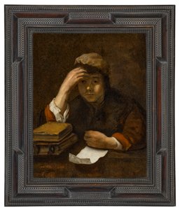 Ein Junge liest von (studio of) Rembrandt Harmensz. van Rijn