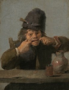 Jugendlicher, der eine Grimasse schneidet