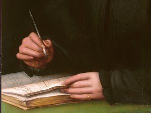 Porträt eines jungen Mannes mit einem Buch