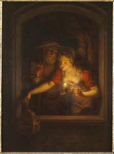 Eine Frau mit einer brennenden Kerze