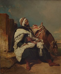 Sitzender arabischer Mann mit Pferd von Alfred Dedreux