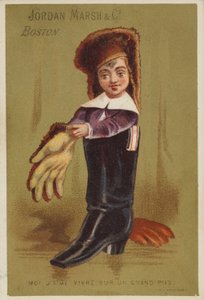 Junge steht in Erwachsenenstiefel von American School