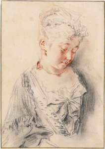 Sitzende Frau, die nach unten schaut
