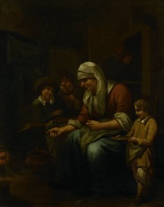 Frau macht Pfannkuchen