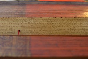 Birmanisches Palmblattmanuskript (Holz und Pergament)