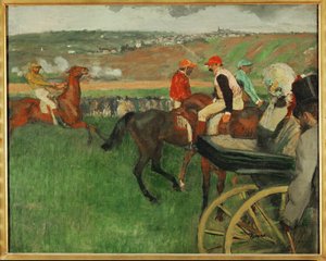 Le champ de courses. Jockeys amateurs près d