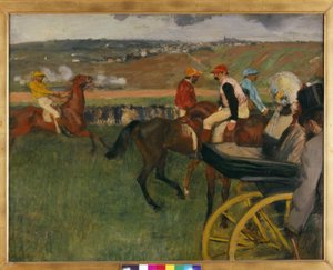 Das Rennfeld. Amateurjockeys neben einem Wagen