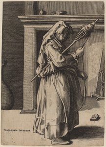 Alte Frau mit einer Spindel