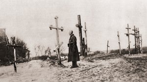 Ein russischer Soldat am Grab eines Kameraden während des Ersten Weltkriegs, aus The Illustrated War News, 1915