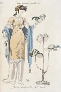 Englische Modeplatte, die eine junge Frau zeigt, die einen Hut auswählt, 1812 von English School