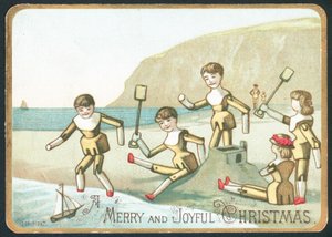 Spielzeug spielt am Strand, Weihnachtskarte