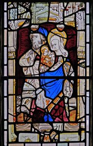Fenster Ew, Darstellung von St. Anna, Joachim, der Jungfrau Maria und dem Christkind von English School