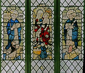 Fenster w4 zeigt die Pietà mit St. Dominikus und St. Peter Martyr: kleine Stifterfiguren