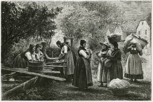 Eine Wäscherei in Metzeral, Frauen in traditionellen Taltrachten versammeln sich am Dorfbrunnen