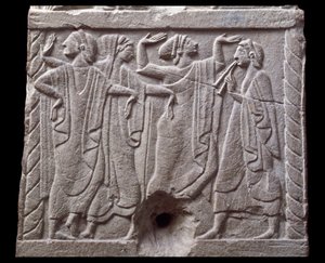 Relief mit Tänzern von einem Marmor-Meilenstein aus Chiusi, Italien, 6. Jahrhundert v. Chr.