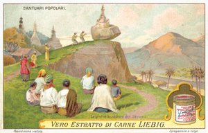 Siam-Buddhisten beten an einem Schrein mit Balancierstein von European School