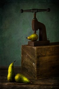 Birnen und Vintage-Presse