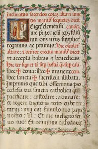 Initiale T: Ein Priester feiert Messe
