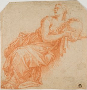 Verhüllte Frau mit Urne