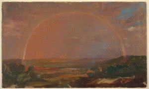 Regenbogen über einer Hügellandschaft