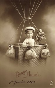 Neujahrskarte 1913, mit einem Jungen, der einen Ballon besteigt, mit viel Geld als Ballast