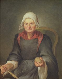 Eine alte Frau beim Spinnen