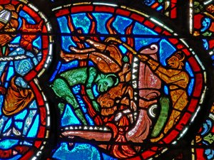 Detail eines Fensters, das das Jüngste Gericht darstellt: Der Höllenschlund