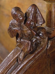 Musiker, der eine Doppelflöte spielt, Detail aus einem Chorgestühl, 14.-16. Jahrhundert (Holz) von French School